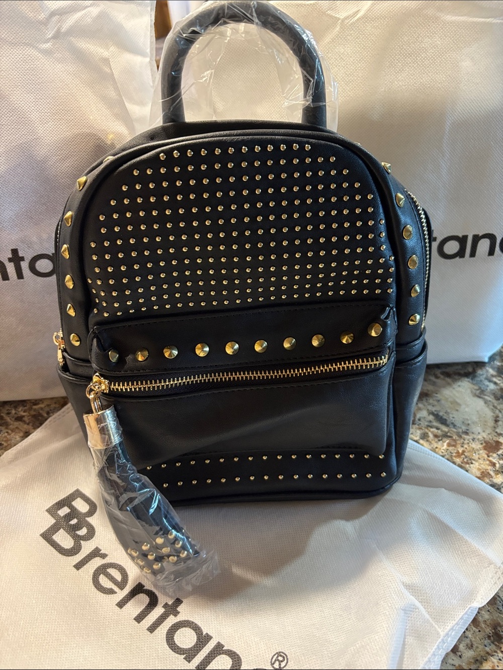 Brentano Super Soft Black Studded Mini Backpack with Gold Accents
